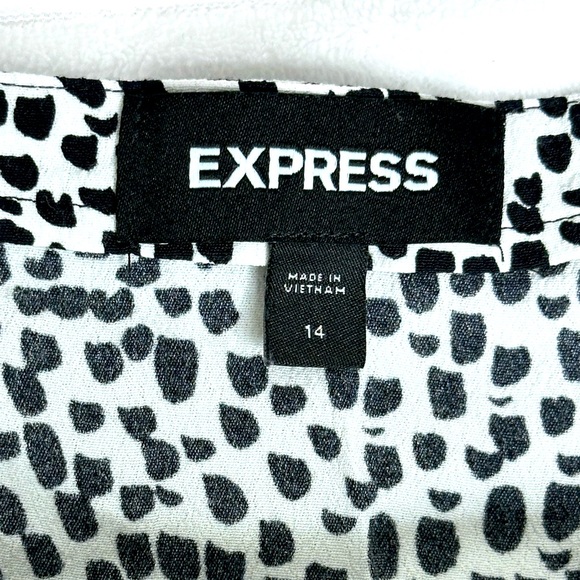 Express | Black & White Dotted Ruffled Wrap Mini Skirt with Tie - Picture 6 of 8